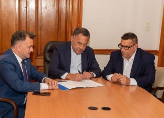 CONVENIO MARCO DE COOPERACIÓN ENTRE EL TRIBUNAL FISCAL DE APELACIÓN Y LA ESCUELA DE GOBIERNO DE TUCUMÁN